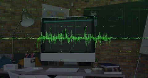 Innovative Workstation with Computer Displaying Green Waveform Graphics
