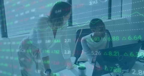 Colleagues Collaborating on Stock Data Analysis at Office