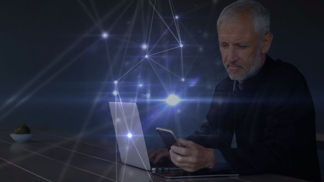 Senior Caucasian businessman using a smartphone while working on a laptop. Glowing network connections symbolizing digital networking and global communication appear around him. Ideal for illustrating business technology advancements, remote working solutions, or digital communication networks.