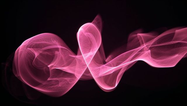 Glowing Pink Ribbons Creating Abstract Loops in Dark Void