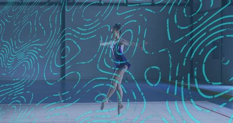 Graceful gymnast leaping in blue sequined leotard with turquoise contour pattern overlay