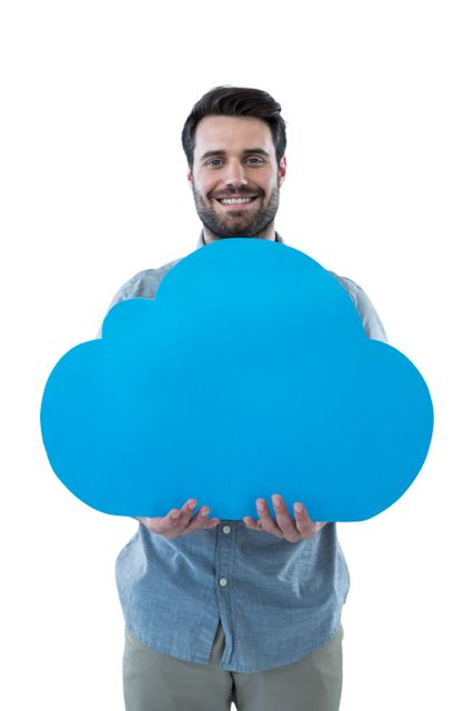 Smiling man holding a cloud cut out against white background