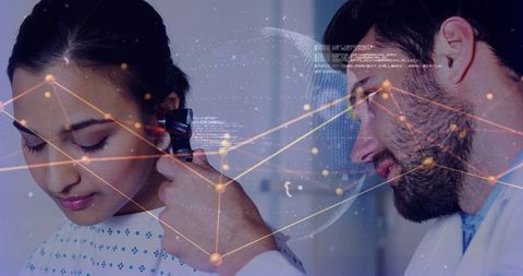 Doctor using otoscope in technological health assessment