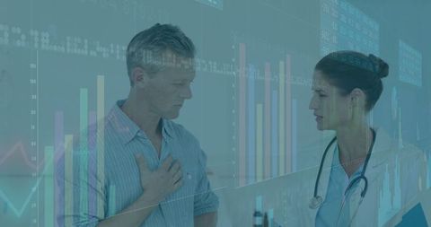 Patient Consulting Doctor in Clinic with Health Charts