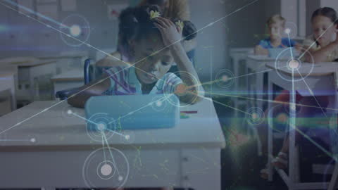 Young Student Engaging with Technology in Classroom