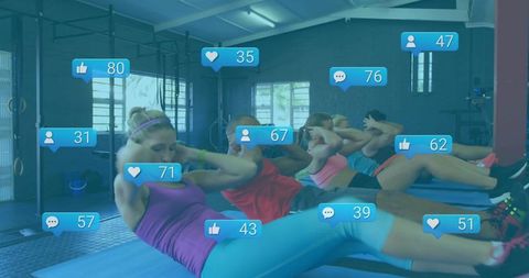 Fitness Group Engaging in Crunches with Social Media Interaction Icons