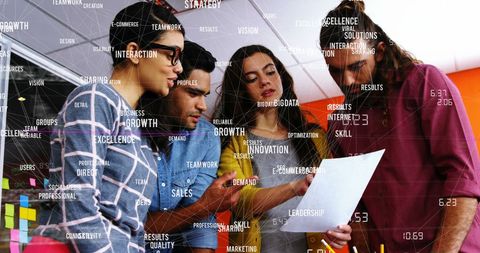 Diverse Team Collaborating with Data Annotations in Modern Office