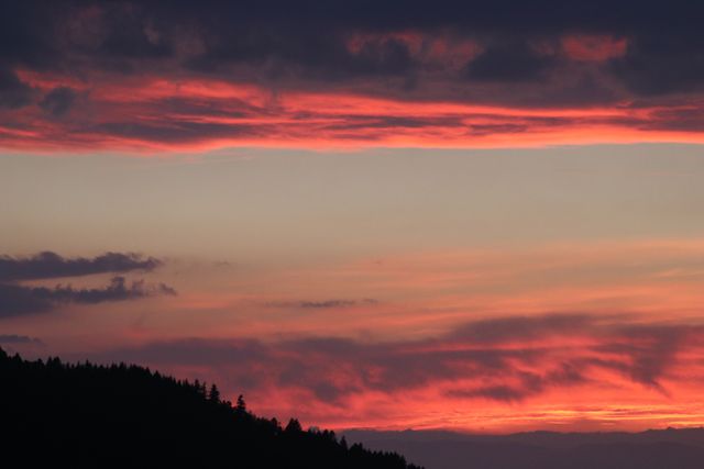 Vibrant Sunset Sky with Dramatic Clouds over Mountain - Download Free Stock Photos Pikwizard.com