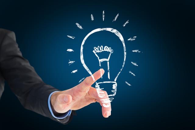 Hand pointing at sketched light bulb on dark background symbolizes creativity and innovation. Ideal for business presentations, creative thinking concepts, energy solutions, idea generation, marketing materials, and inspiration-related themes. Use in blogs, articles, or social media posts to depict fresh ideas and strategic planning.