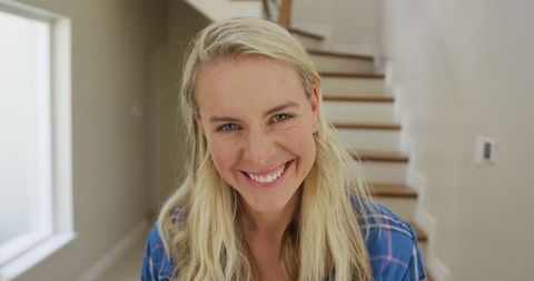 Cheerful Caucasian Woman Smiling Outdoors Home Setting