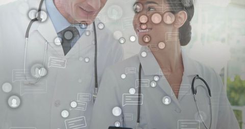 Doctors Reviewing Data with Digital Interface in Hospital Setting