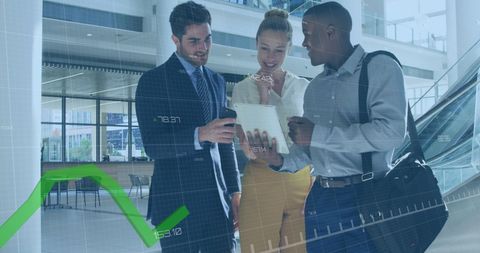 Business Team Discussing Financial Growth with Digital Graph Overlay