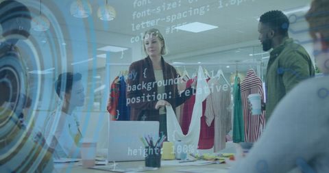 Fashion Designer Discussing Concepts with Digital Overlays