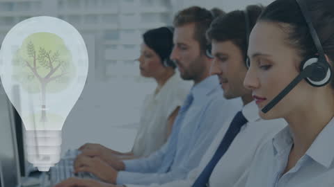 Team with Headsets and Light Bulb Graphic Symbolizing Innovation