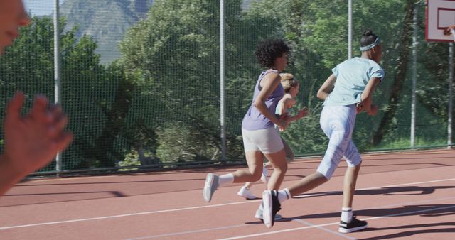 Multiracial Teenagers Running on Outdoor Track - Download Free Stock Images Pikwizard.com