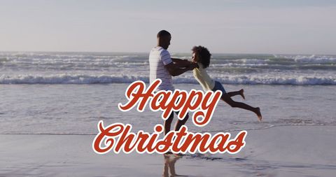 Festive Christmas Greetings on Beach with Family - Download Free Stock Images Pikwizard.com