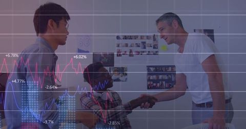 Multicultural business team shaking hands with analytical overlay