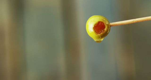 Closeup Of Green Olive On Toothpick With Drop - Download Free Stock Images Pikwizard.com