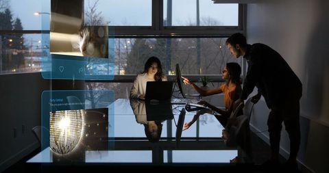 Diverse Business Team Working on Social Media Analysis at Dusk