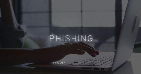 Phishing concept showing typing hands on laptop