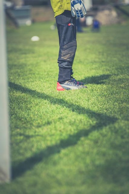 Young Soccer Goalkeeper Ready to Defend Goal on Field - Download Free Stock Photos Pikwizard.com