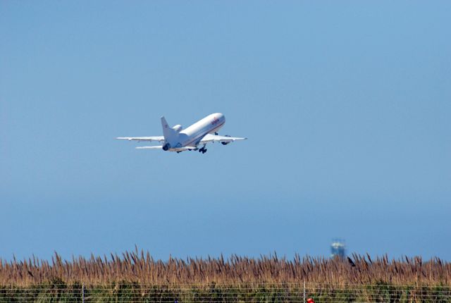 VANDENBERG AIR FORCE BASE, Calif. –  Orbital Sciences’ L-1011 aircraft takes off from Vandenberg Air Force Base in California for the Kwajalein Atoll, a part of the Marshall Islands in the Pacific Ocean.  Under its wing is NASA’s Interstellar Boundary Explorer, or IBEX, spacecraft and Pegasus XL rocket.  Departing from Kwajalein, the Pegasus rocket will be dropped from under the wing of the L-1011 over the Pacific Ocean to carry the spacecraft approximately 130 miles above Earth and place it in orbit.  Then, the spacecraft’s own engine will boost it to its final high-altitude orbit (about 200,000 miles high) — most of the way to the Moon. The IBEX satellite will make the first map of the boundary between the Solar System and interstellar space.  IBEX science will be led by the Southwest Research Institute of San Antonio, Texas.  IBEX is targeted for launch over the Pacific Oct. 19.   Photo credit: NASA/Randy Beaudoin, VAFB