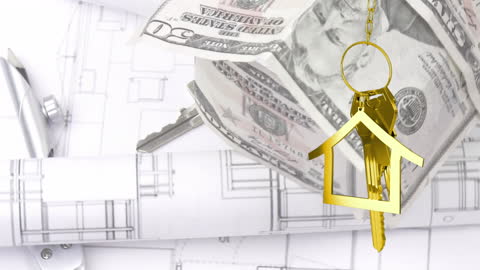 Real Estate Investment Concept with Keys and Blueprint