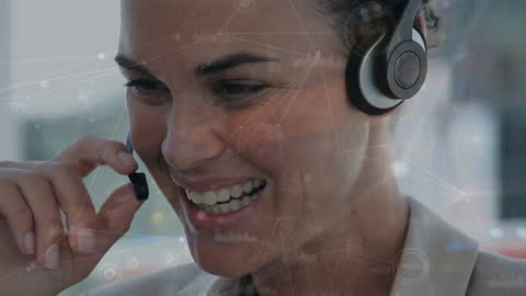 Smiling Call Center Agent with Headset and Graphical Data Overlay
