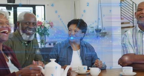 Mature adults enjoying tech-infused social gathering with augmented reality overlay