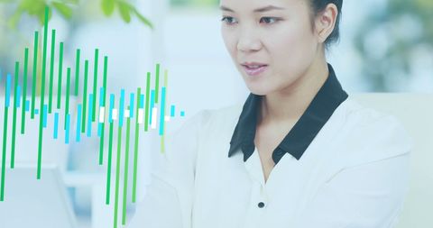 Asian Businesswoman Analyzing Digital Financial Data