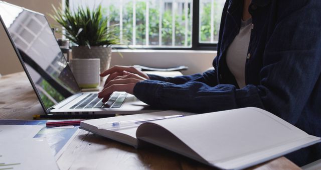 Person Typing Laptop At Cozy Home Office Desk During Daytime - Download Free Stock Images Pikwizard.com