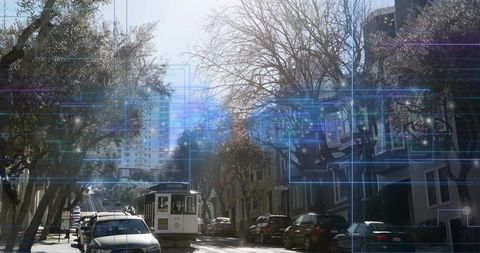 Cable car climbing steep urban street amidst leafy neighborhood