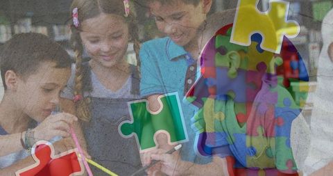 inclusive learning: children engaging with autism awareness, colorful puzzles - Download Free Stock Images Pikwizard.com