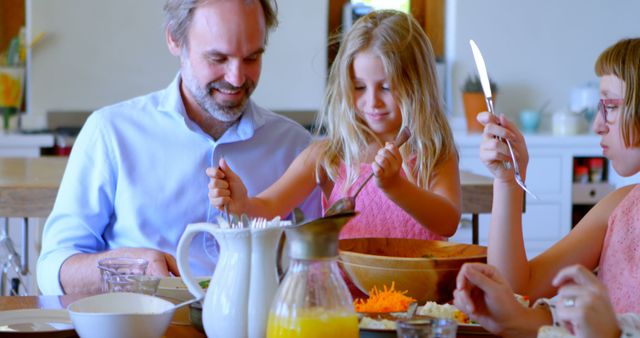 Family Enjoying Healthy Family Breakfast Together - Download Free Stock Images Pikwizard.com