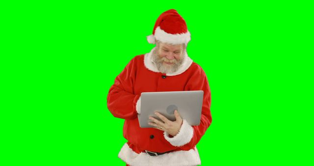 Santa Claus Using Tablet Green Screen Background - Download Free Stock Images Pikwizard.com