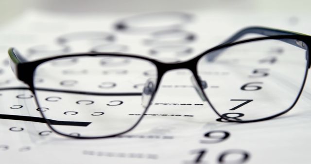 Reading Glasses on Eye Test Chart in Optometrist Clinic - Download Free Stock Images Pikwizard.com