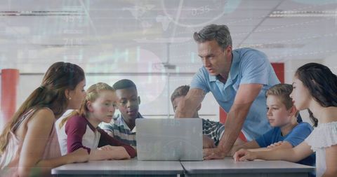 Teacher Engages Multiracial Students with Technology in Classroom - Download Free Stock Images Pikwizard.com