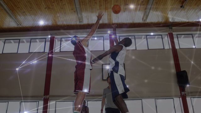 Basketball players in action with digital network overlays emphasizing connection and strategy. Suggests global sport networking and technological innovation. Suitable for illustrating athletic themes, digital transformation in sports, or team-building concepts.