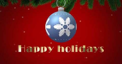 Features a blue Christmas bauble with a white snowflake design hanging against a red background. This is perfect for use in holiday greeting cards, festive event invitations, and Christmas promotional materials. The image exudes a cheerful and traditional holiday atmosphere, making it suitable for seasonal marketing content.