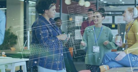 Diverse team collaborating in modern office lounge with digital data overlay dashboard