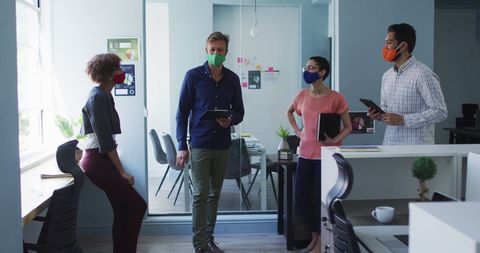 Creative Team Collaboration with Masks in Modern Office - Download Free Stock Images Pikwizard.com