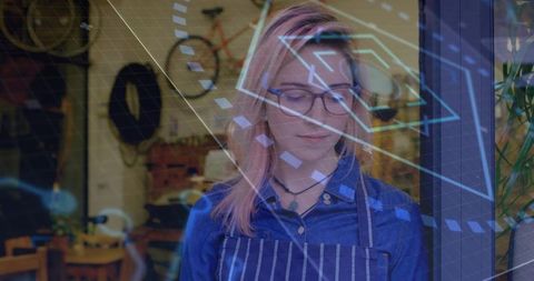 Female Bicycle Mechanic Embracing Technology in Modern Workshop