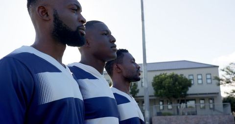 Focused African American Athletes Preparing for Competition Outdoors