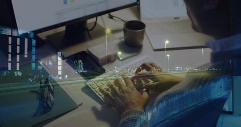 Businessman Analyzing Data over Urban City Nightscape - Download Free Stock Images Pikwizard.com