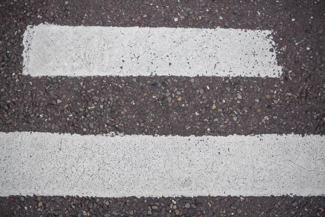 Road marking on road surface, full frame