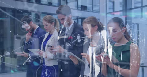 Business Professionals Engaged with Digital Technology and Data Networks