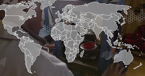 Global food testing technician adjusting lab equipment with tomatoes and world map overlay