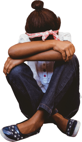 Transparent view of girl with bow hairband sitting sadly