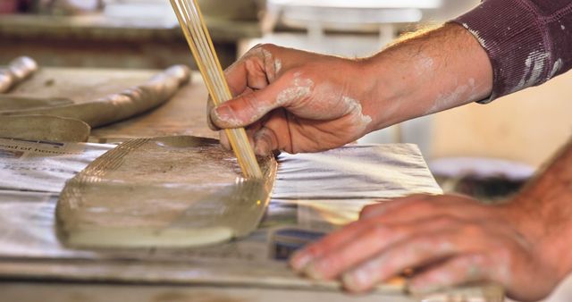 Close-up of Hand Sculpting Clay with Tools - Download Free Stock Images Pikwizard.com