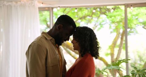 Romantic Moment with Diverse Couple in Cozy Home